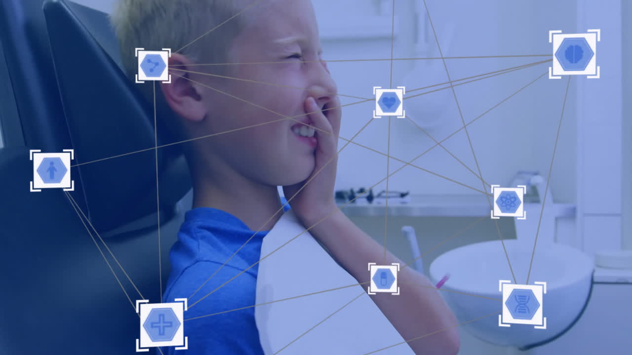 Medical network and healthcare icons animation over child holding cheek in dental clinic