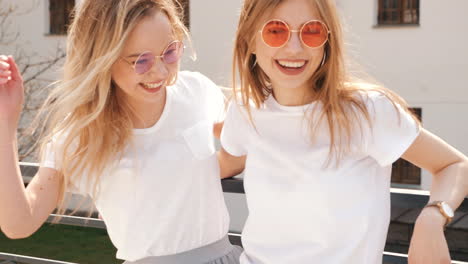 two friends having fun on a rooftop