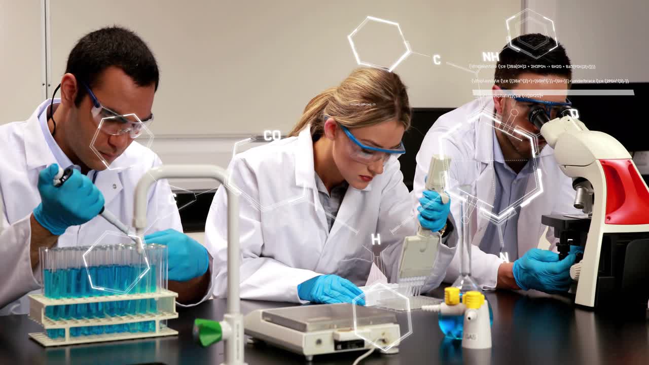 Lab team starting run for assay, pipetting and viewing while AR hex tracking plate and microscope