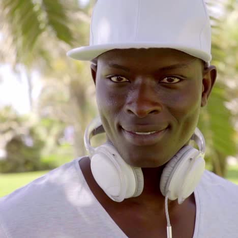 handsome young man in a baseball cap