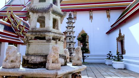 stone statue in temple courtyard, wat pho, bangkok