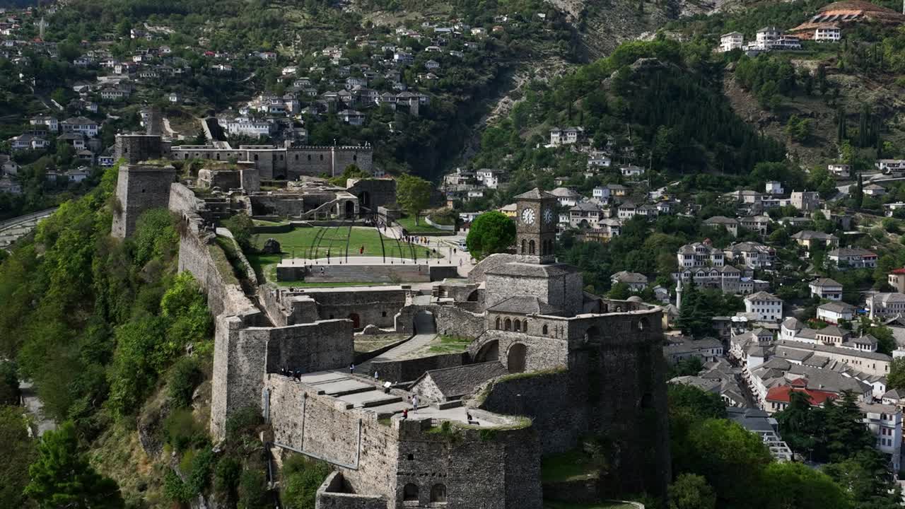 Aerial view of Gjirokaster Castle (Fortress) during the day in Gjirokaster, Albania, establishing drone shot