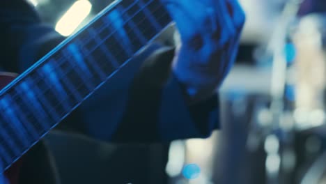 guitar player on stage at a concert rocking the audience