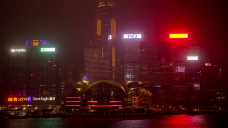 hong kong - 19 march 2025 : hong kong central city skyline filmed from across the harbour in kowloon with all the skyscrapers lit up at night advertisements