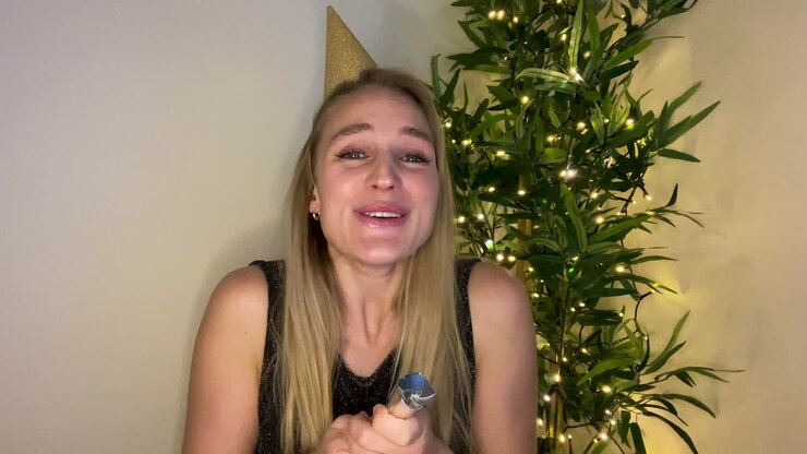 Young Woman On Video Call Countdown to New Year and Celebrating with Party Popper