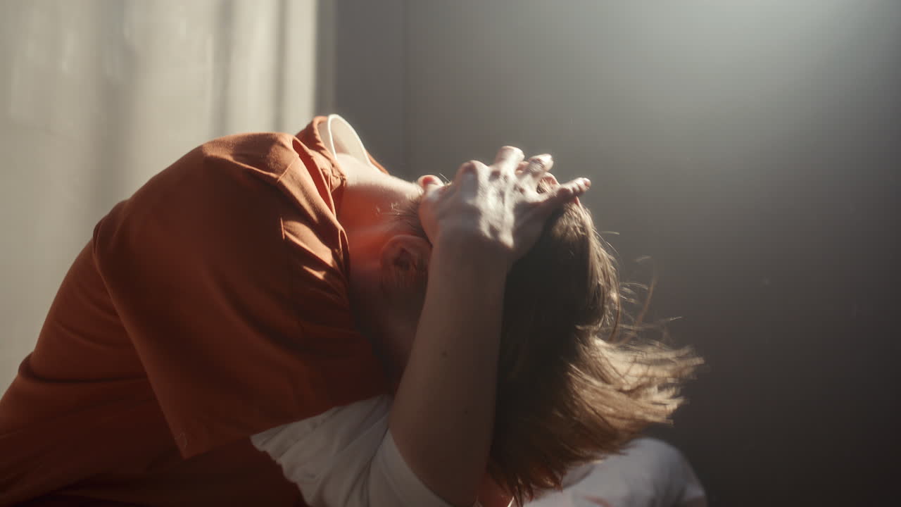 Sad Female Inmate Emotionally Crying in Solitary Prison Cell