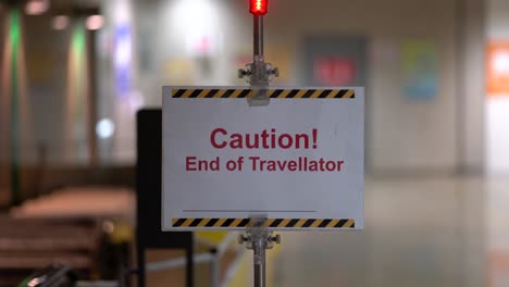 Caution-end-of-travellator-at-subway-station