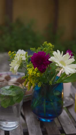 rustic outdoor dinner with flowers