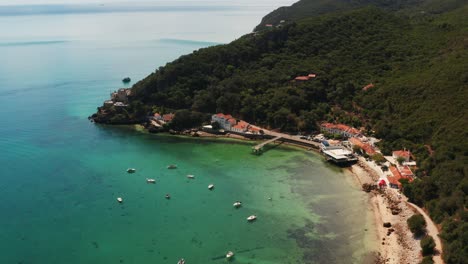 Aerial-Shot-of-the-turquoise-beaches-and-small-villages-along-the-coast-of-Portugal