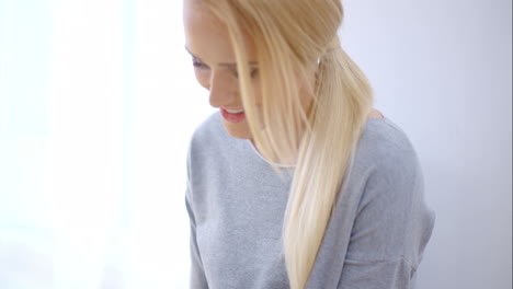 young woman surfing the internet on a tablet