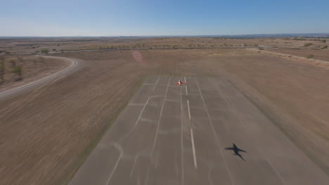 remote control airplane taking off from model airplane runway