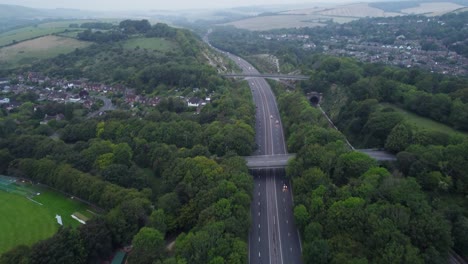 drone shot of bridges over motorway in the countryside