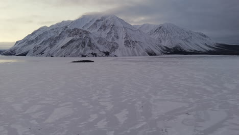 winter snow background at kathleen lake within kluane national park in yukon, canada. aerial wide shot