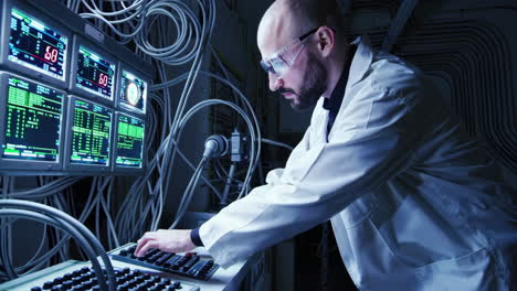 scientist operating complex laboratory equipment