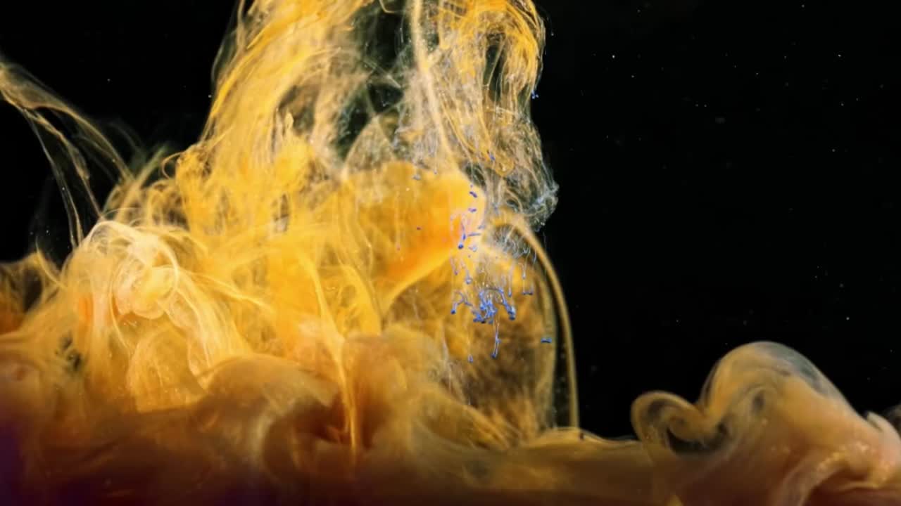 синий и желтый цвет смешиваются в воде. анимация