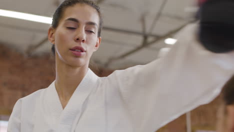 young woman doing martial arts