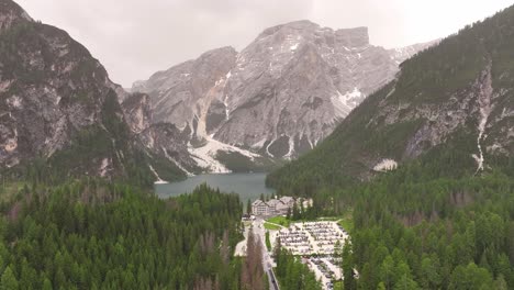lake pragser wildsee italy dolomites mountains valley, aerial evergreen spruce tree forest