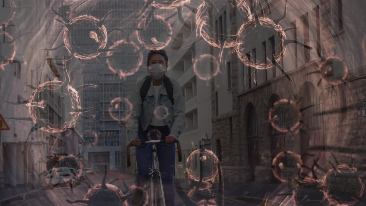 얼굴 마스크를 쓰고 있는 여성에게 퍼지는 거대 코로나바이러스 세포의 애니메이션