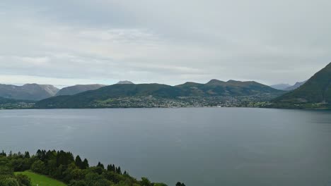 Aerial-over-the-waterfont-of-Folkestad,-Norway