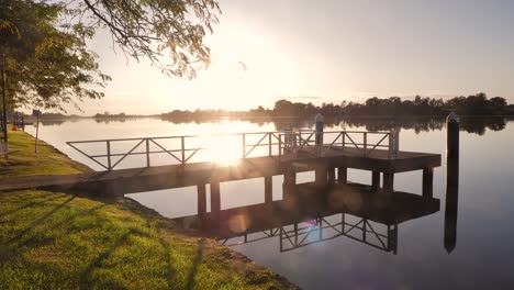 jetty on the manning river at sunrise, taree, new south wales, australia.