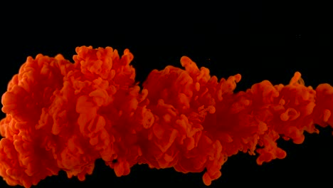 red paint in the water