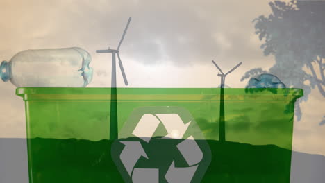animación de una caja verde de reciclaje con cajas de plástico y turbinas eólicas