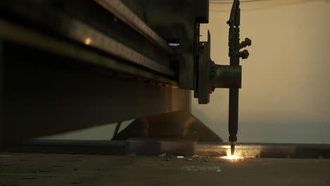 laser precision unfolds: watch sheet metal yield to the seamless brilliance of cutting light in this captivating stock footage