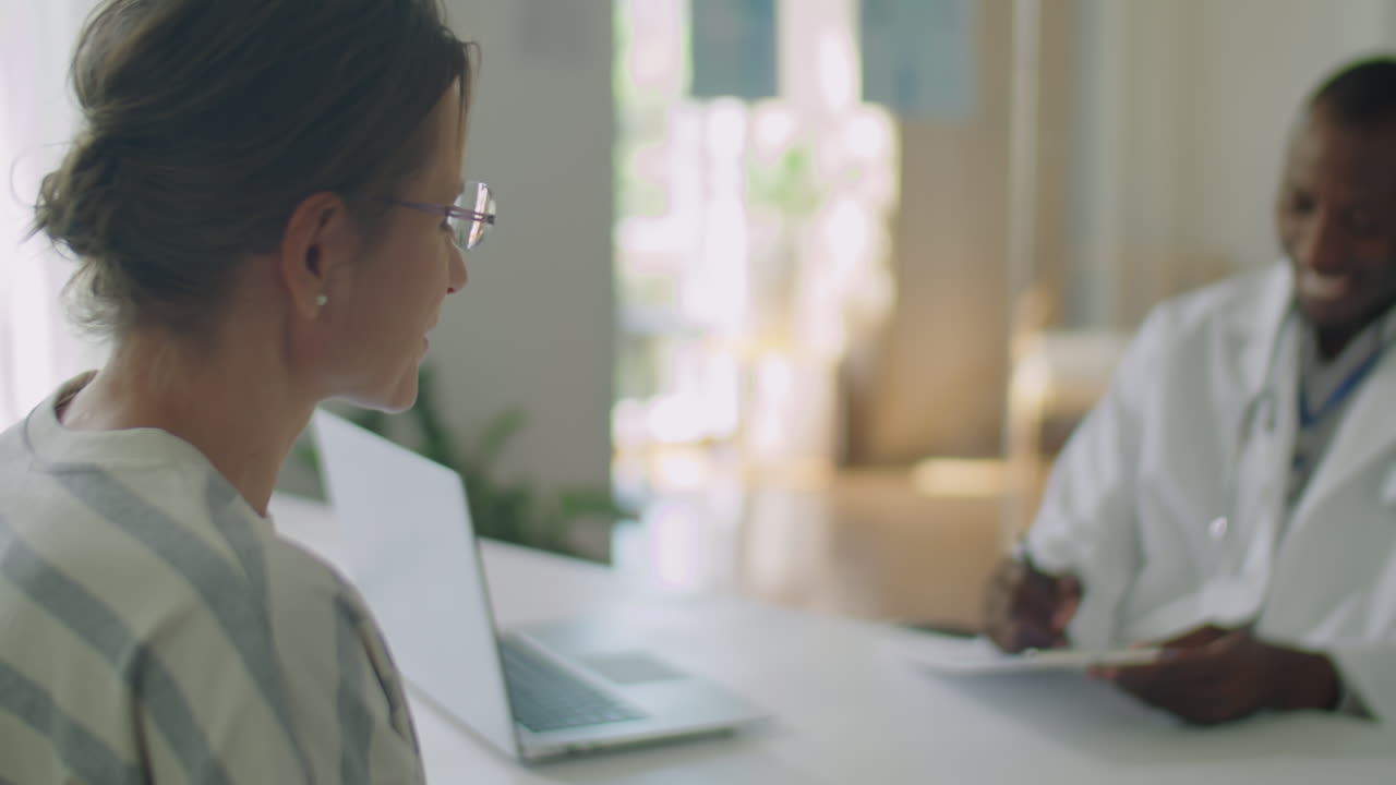 Female Patient Getting Health Consultation in Clinic