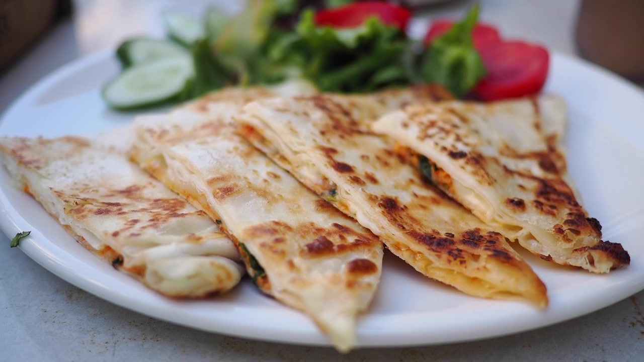 Freshly Cooked Gozleme Served on a Plate with Salad