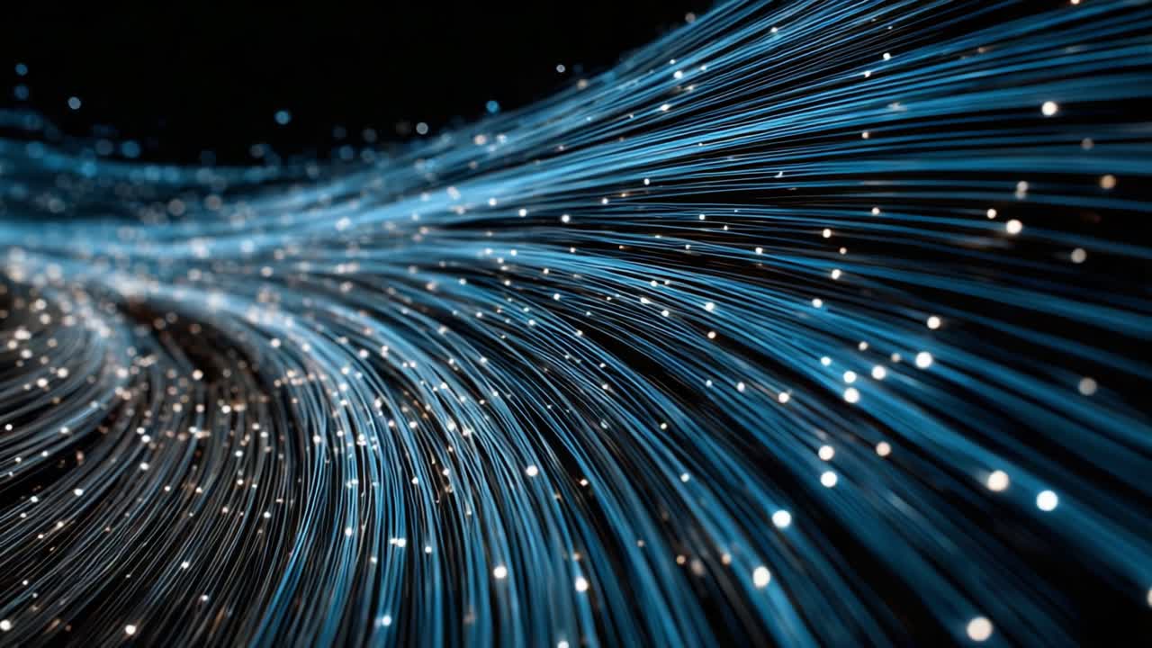 A Captivating Flow of Luminous Blue Particles and Light Trails in a Dark Environment, Evoking a Sense of Motion and Depth through Striking Visuals