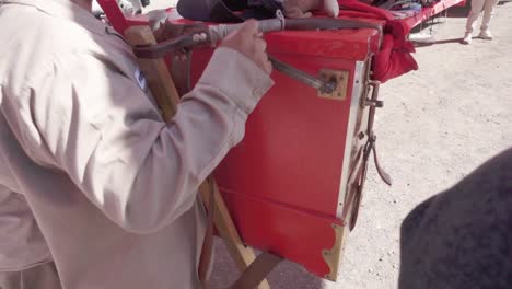 Organillero-playing-his-instrument,-an-organ-in-the-streets-of-Mexico