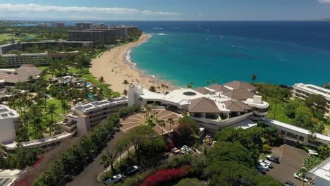 rotating aerial view of kaanapali beach over the sheraton hotel on the island of maui, hawaii