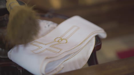close-up of religious artifacts with holy water