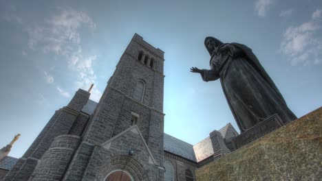 time lapse of clouds passing above church at our lady star of the sea - cape may, nj