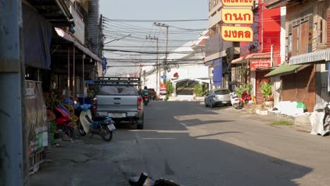 vehicles on a road on a beautiful sunny day in thailand