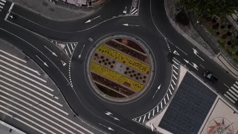 drone ascending over francisco sá carneiro roundabout in funchal, madeira portugal