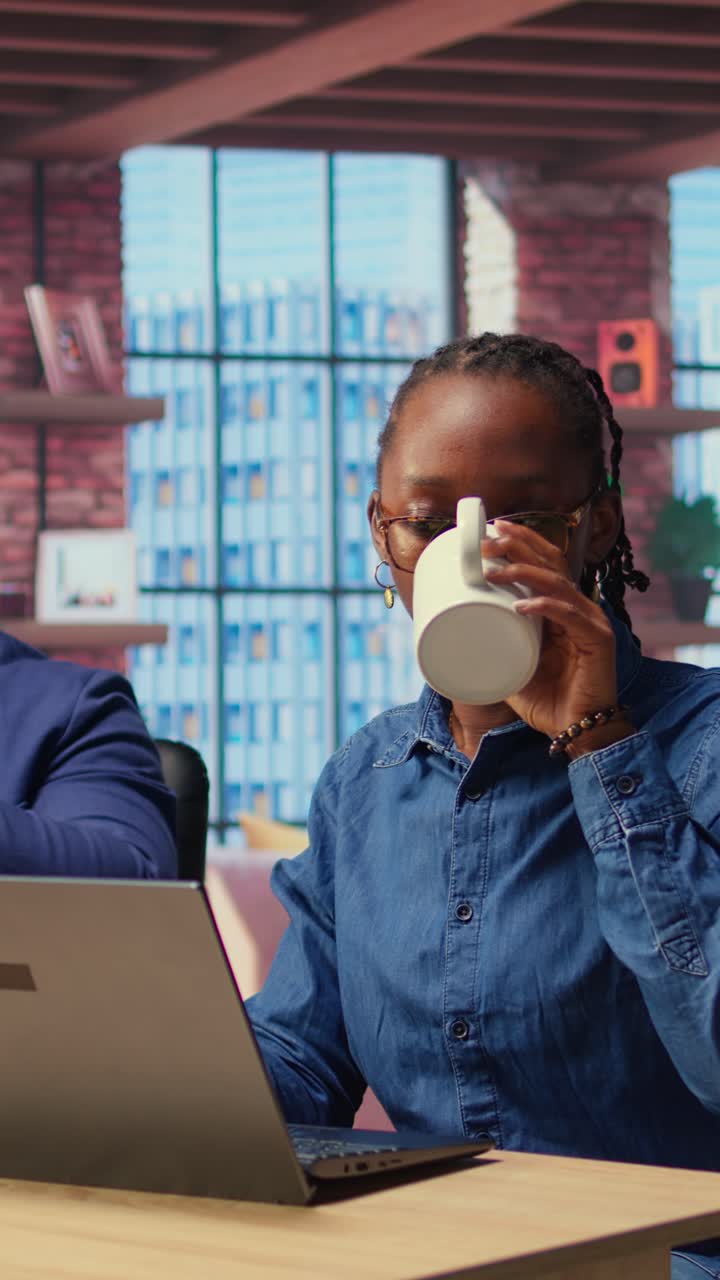 African American Business People Working on Laptops in Modern Office