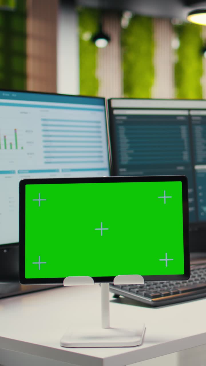 Vertical Video Empty high end workstation with computers and mockup on tablet