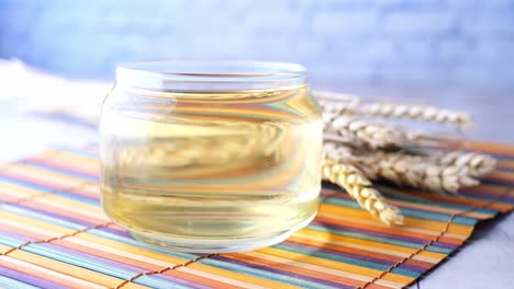 wheat cooking oil bottle on table