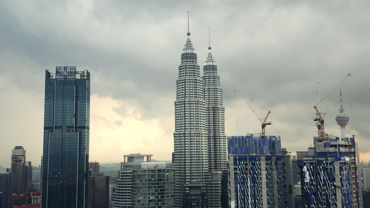 Drone shot of Petronas Twin Towers, Four Seasons Place and Star Residences, Kuala Lumpur