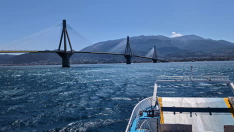 Iconic-Rio-bridge-in-Greece,-view-from-moving-ferry-vessel