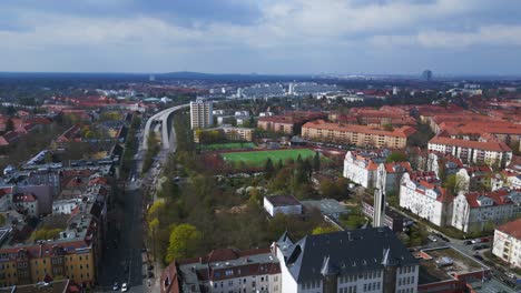 Lovely-aerial-top-view-flight-Berlin-City-green-Soccer-football-field,-district-Steglitz-Germany