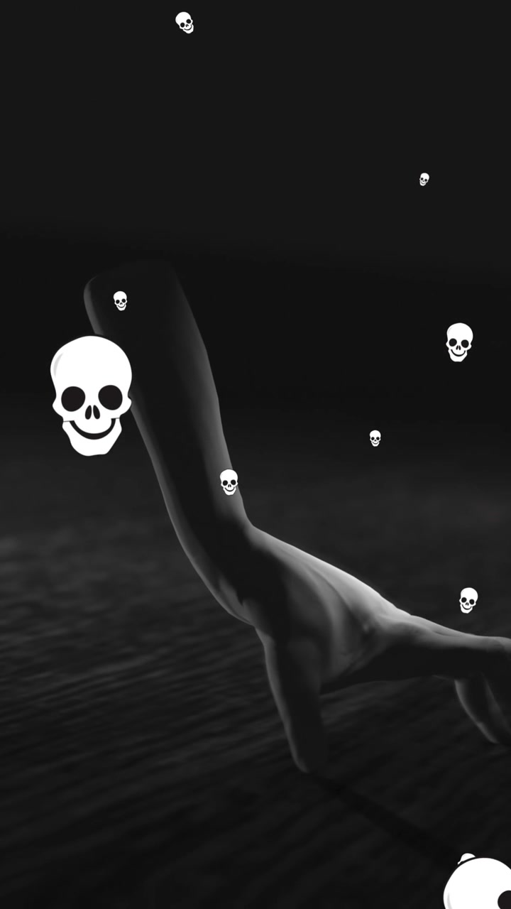 Animation af faldende kranier over en spadserende hånd i sort rum.