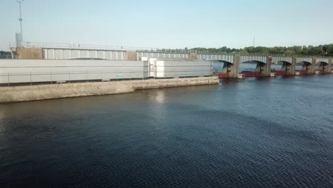 Wide-aerial-view-along-Dam-14-on-the-Mississippi-River-on-a-sunny-summer-day-near-Hampton-Illinois