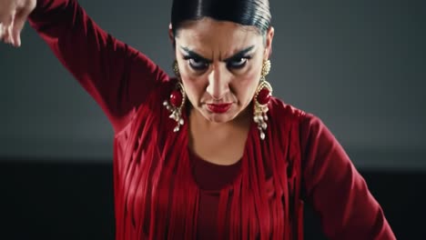 intense dance performance capturing the essences of emotion and skill in elegant moves, showcasing the artistry of a passionate dancer in a striking red ensemble