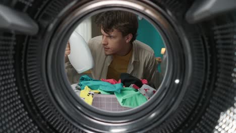 man doing laundry