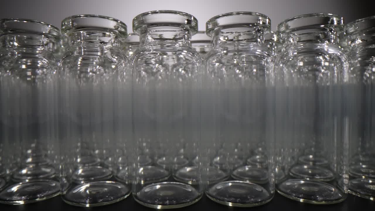 Rows of Empty Clear Glass Vials