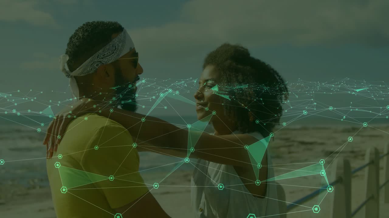 Couple holding hands on promenade, activating overlay while romantically embracing in tech showcase