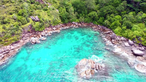 mahe seychelles reveal drone shot of rocks and indian ocean