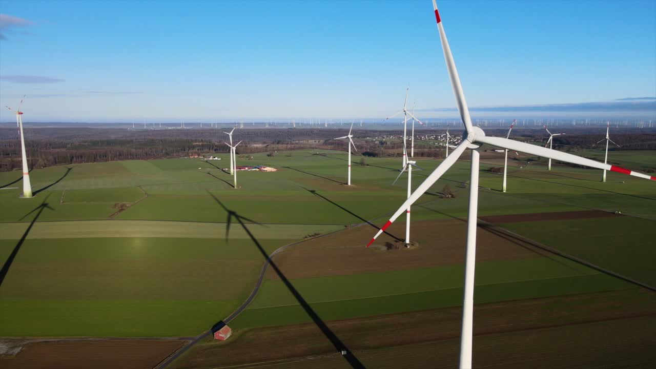 Sustainable Power in Sauerland: Wind Turbines Generating Clean Energy on a Beautiful Field on a Sunny Day in Brilon